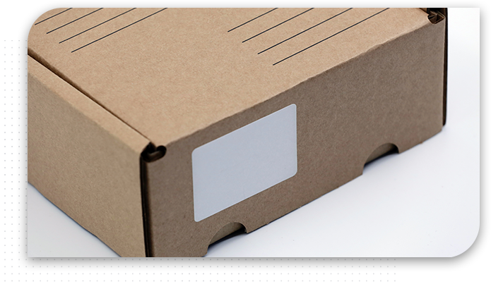 cardboard box with plain white label