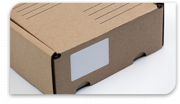 cardboard box with plain white label