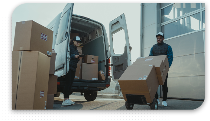 Delivery Man Pushes Hand Truck Trolley